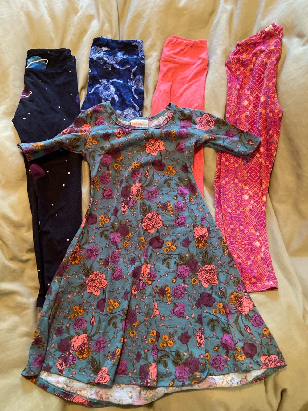 Girls 3T-5T Lularoe Dress (size 4) and four pairs of leggings (size S/M)